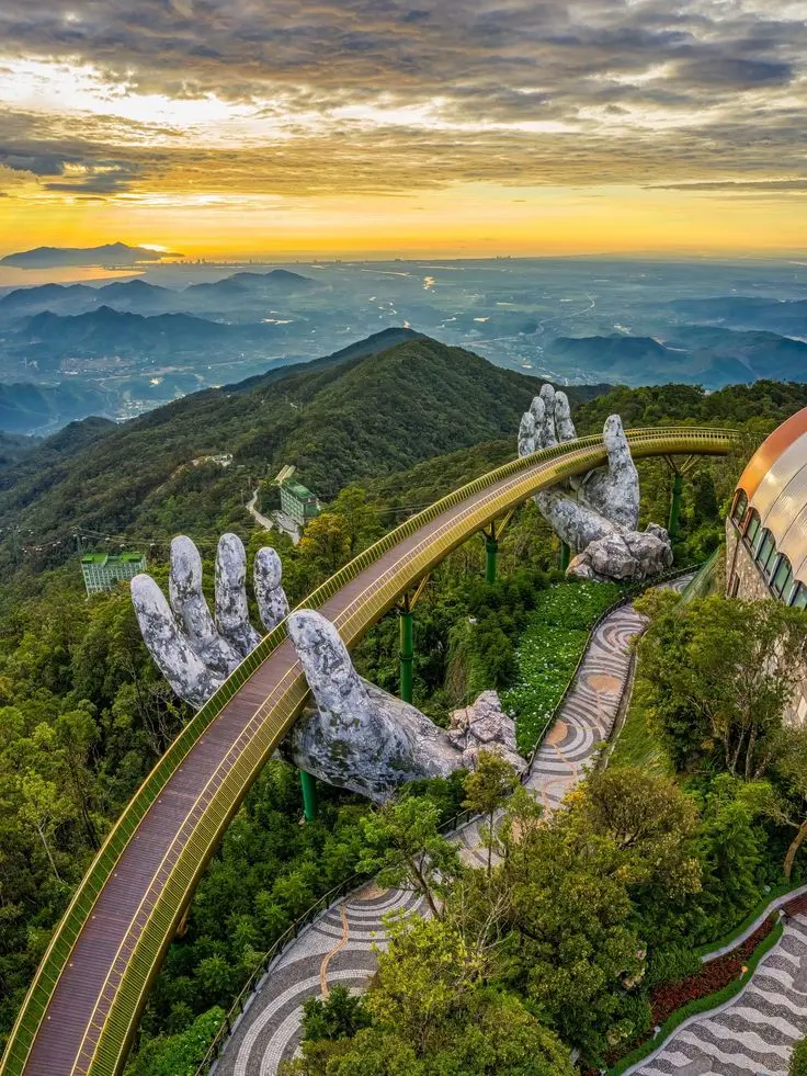 Golden Bridge held by giant hands in Ba Na Hills Vietnam