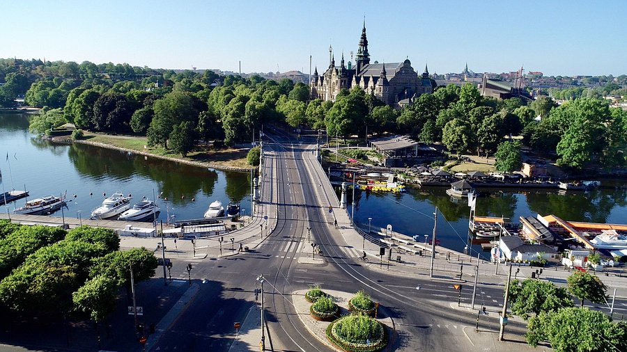 Green park and walking path on Djurgården island in Stockholm