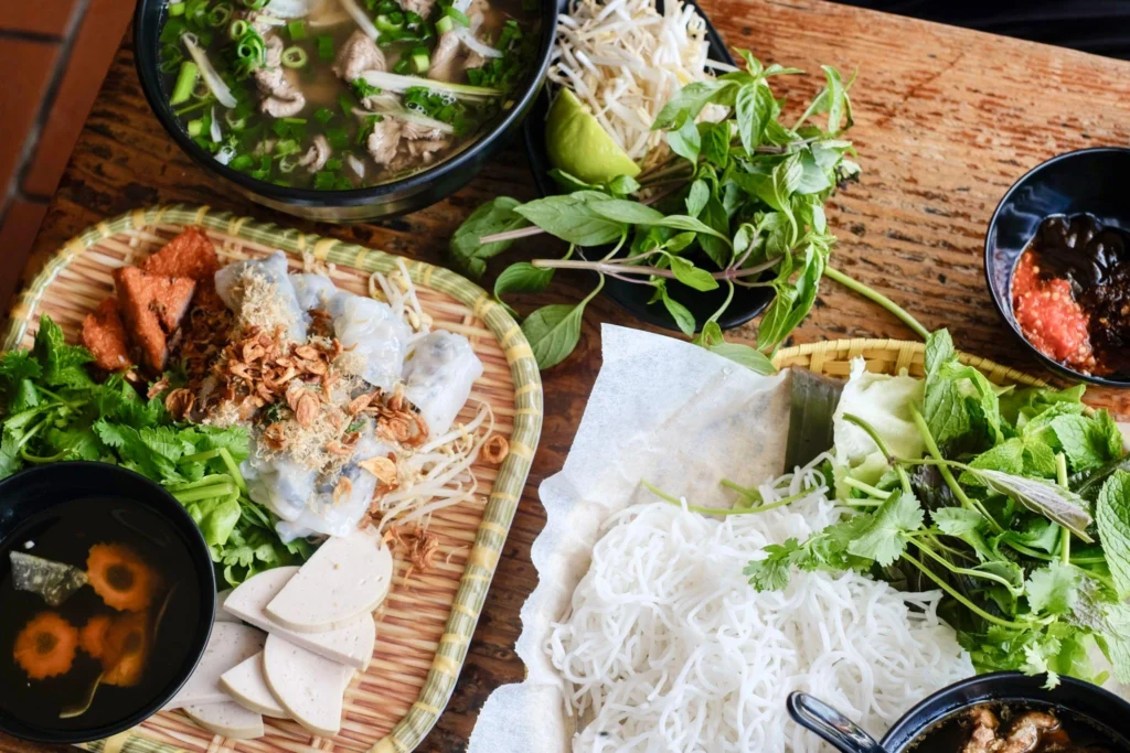 Banh cuon with steamed rice rolls, minced pork, and fried shallots