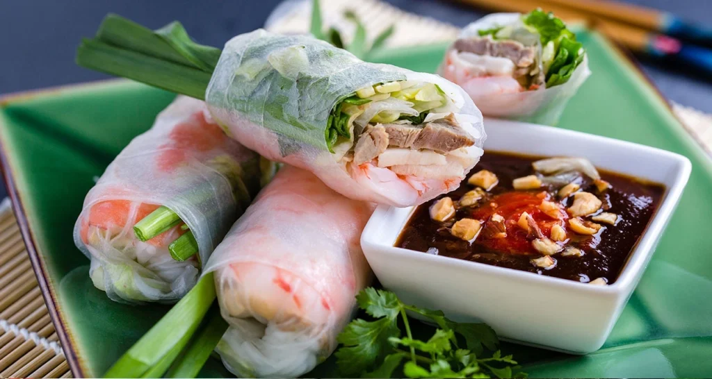 Fresh Vietnamese goi cuon spring rolls with shrimp, herbs, and rice paper
