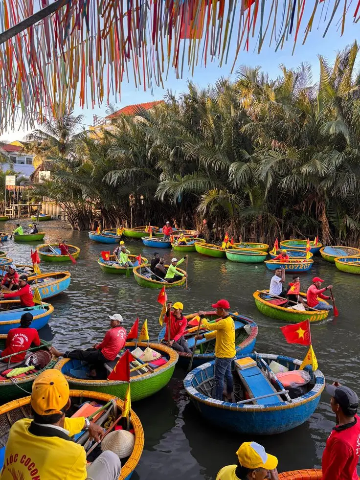 Traditional boat on the river in Hoi An Vietnam with lanterns at sunset