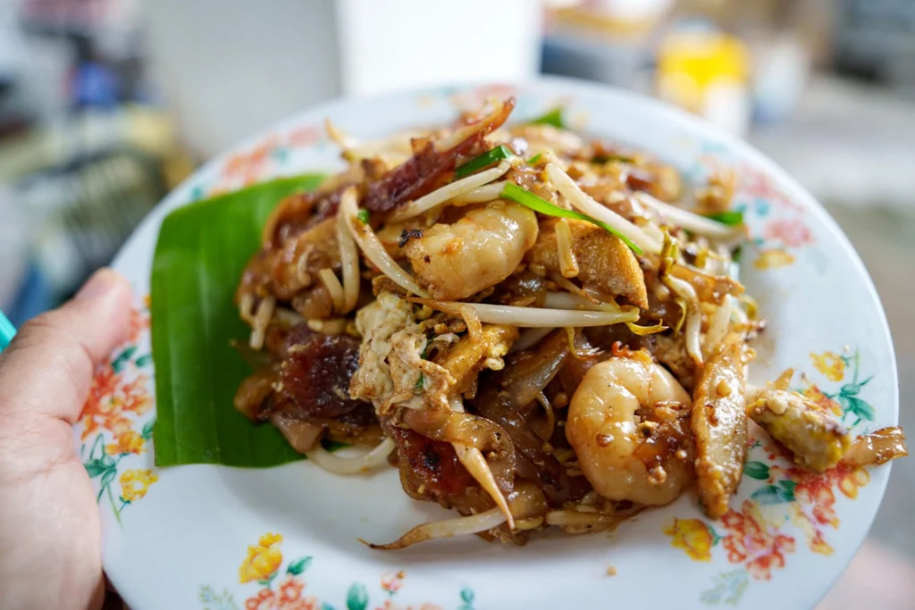 Char kway teow noodles and hawker food in Singapore