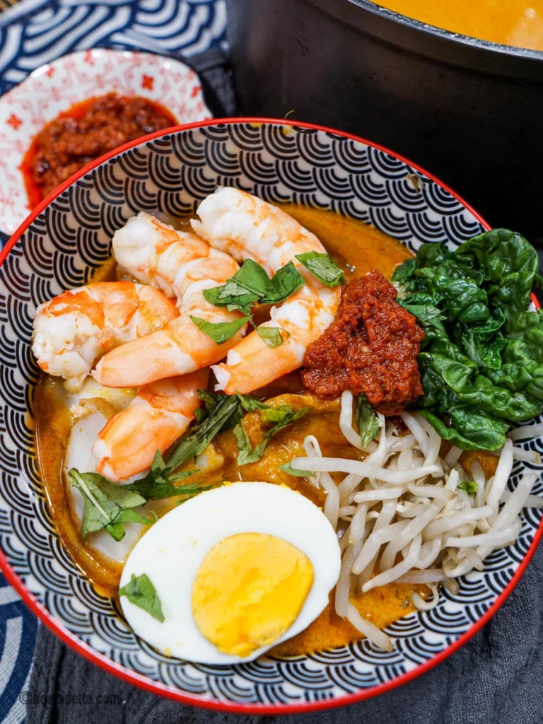 Laksa noodles and spicy local food in Singapore