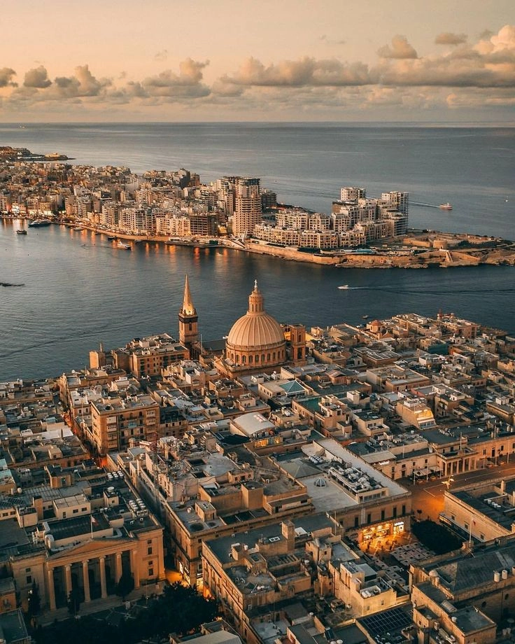 Skyline view of Valletta Malta with historic buildings and the Mediterranean Sea