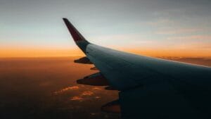 airplane wing at sunset