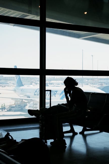 Passengers waiting at airport after flight delay in Europe